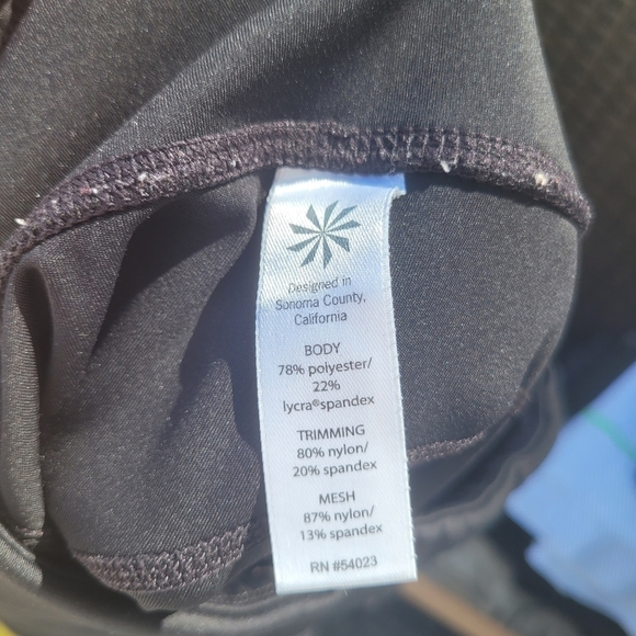 Athleta black mesh panels zipper pocket work out pants size L - Picture 12 of 12